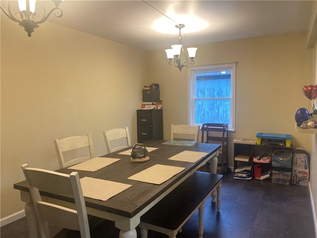 dining area featuring a chandelier