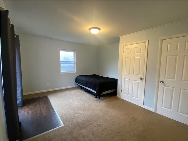 unfurnished bedroom with carpet flooring