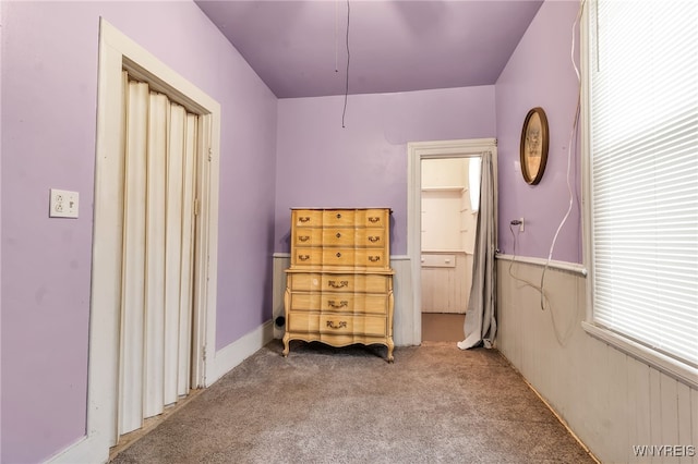 unfurnished bedroom featuring light colored carpet