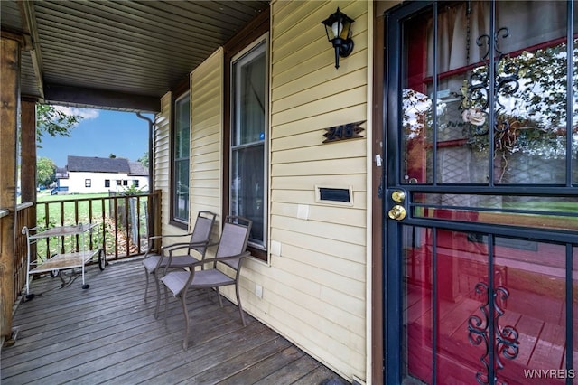 doorway to property with a porch