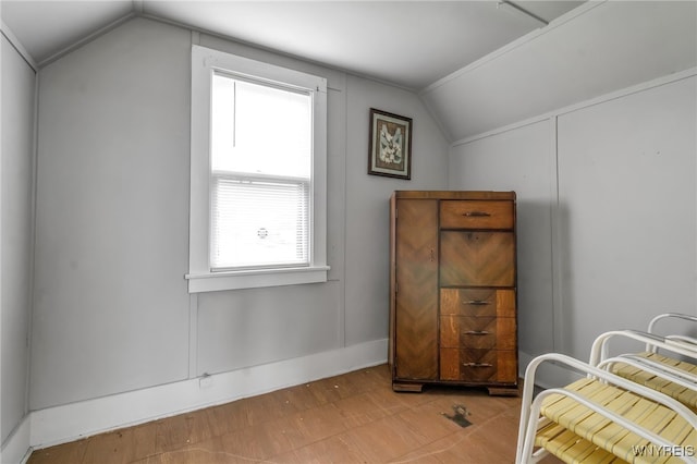 bonus room with a wealth of natural light and vaulted ceiling