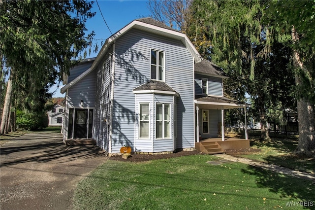 front of property featuring a front yard