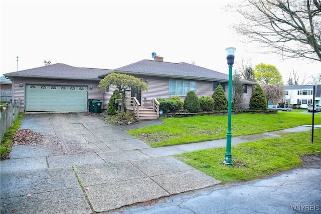 single story home with a front lawn and a garage