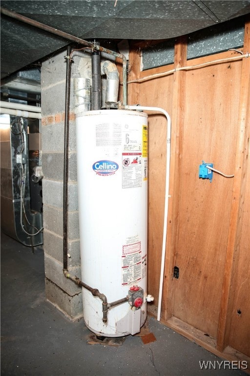 utility room featuring water heater