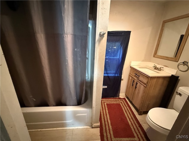 full bathroom featuring vanity, toilet, tile patterned floors, and shower / bath combination with curtain