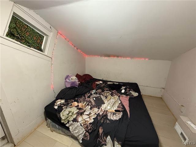 bedroom featuring vaulted ceiling