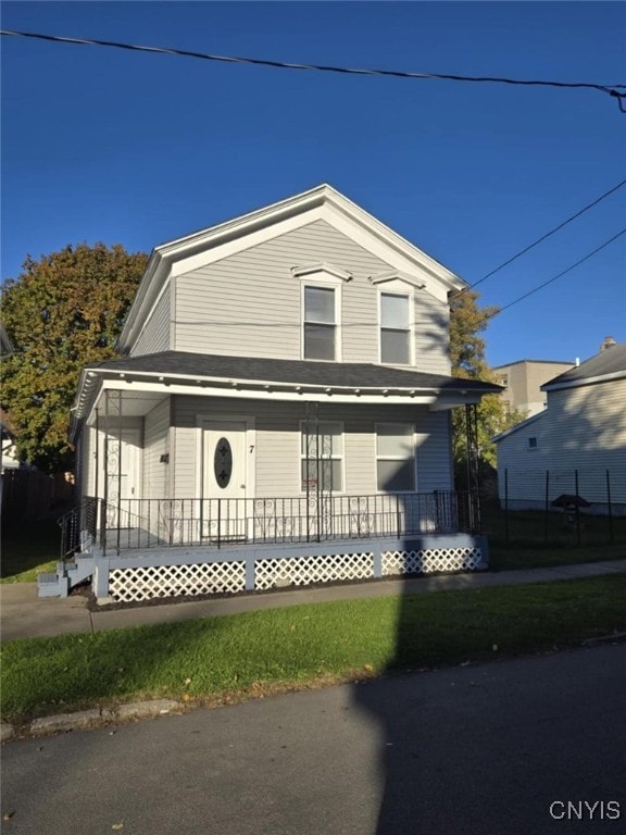 view of property with a porch