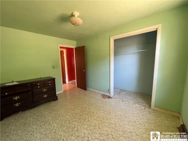 unfurnished bedroom with a closet