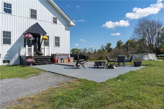 exterior space featuring a fire pit