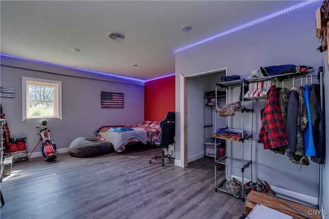 bedroom with wood-type flooring