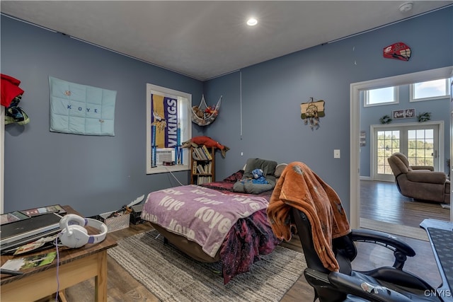 bedroom featuring hardwood / wood-style flooring