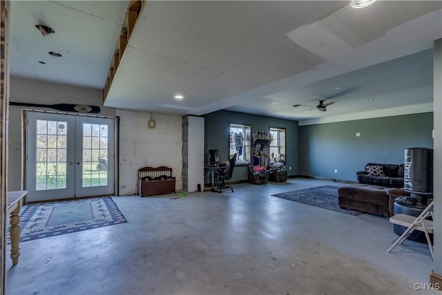 interior space featuring french doors and ceiling fan