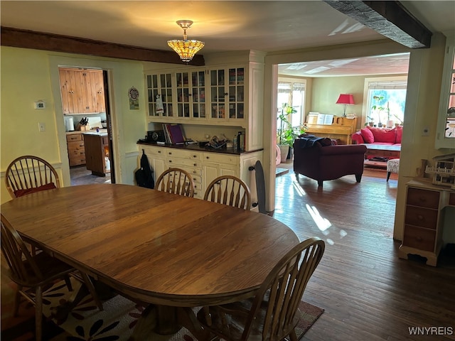 dining area with hardwood / wood-style floors