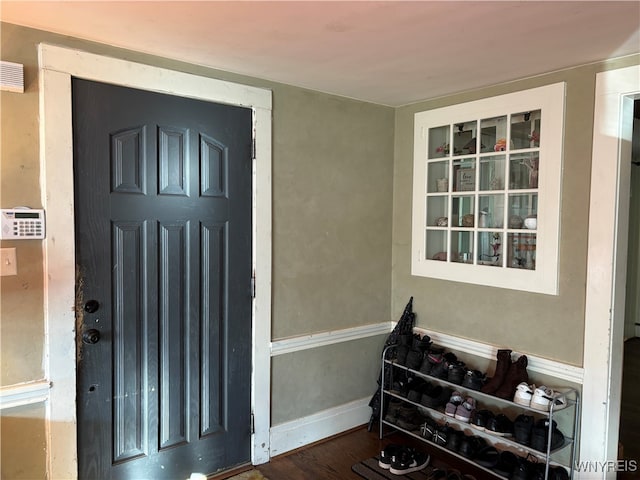 entryway featuring dark wood-type flooring