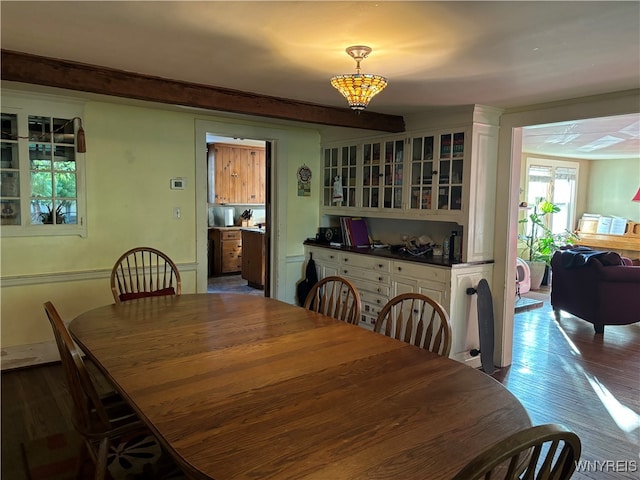 dining area featuring wood-type flooring