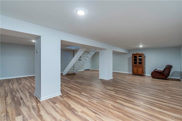 basement with light wood-type flooring