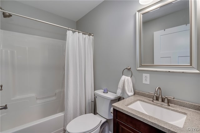 full bathroom with toilet, vanity, and shower / tub combo