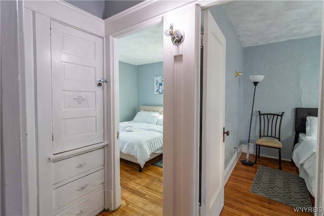 bedroom with wood-type flooring