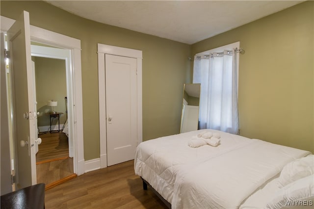 bedroom featuring hardwood / wood-style floors