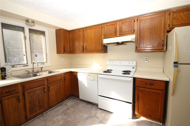 kitchen with sink and white appliances