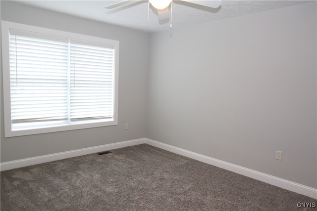 carpeted empty room with ceiling fan