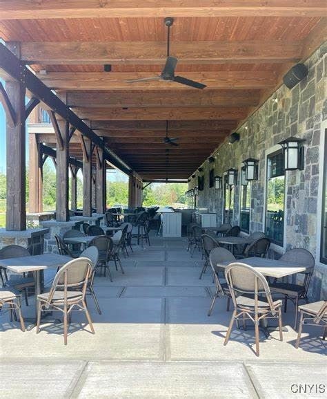 view of patio with ceiling fan