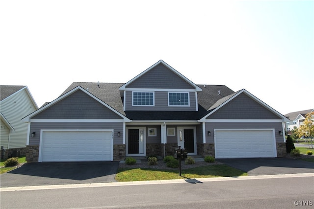 craftsman house with a garage