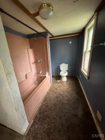 full bathroom featuring baseboards and shower / tub combination