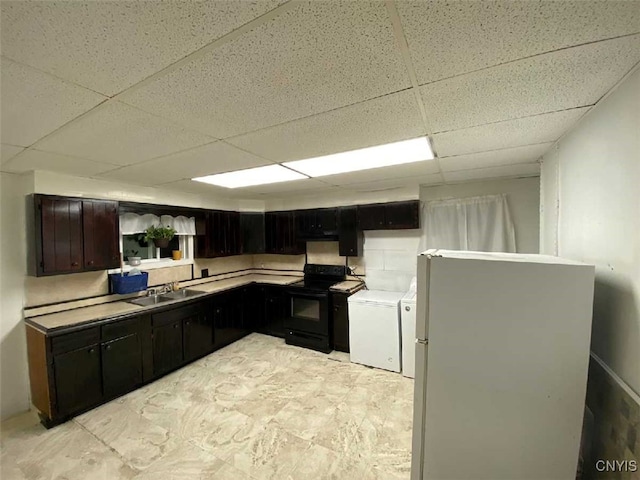 kitchen with dark brown cabinets, a drop ceiling, electric range, refrigerator, and white refrigerator