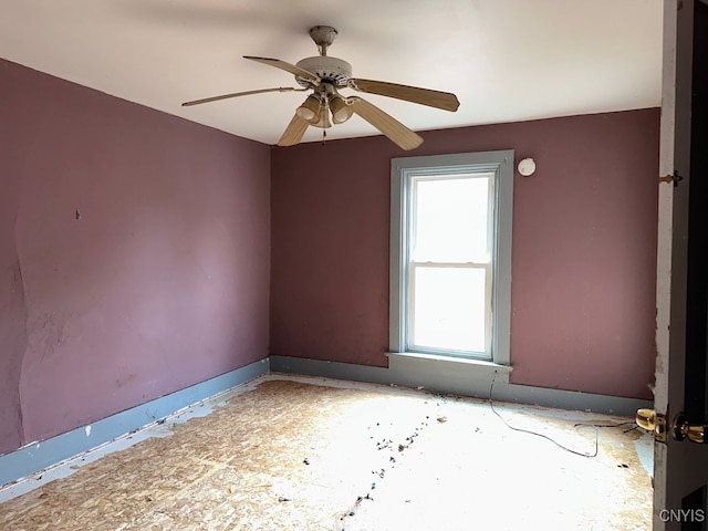 empty room featuring ceiling fan