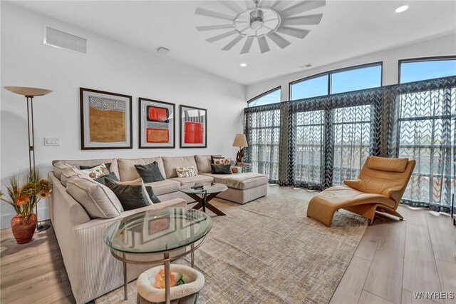 living room with light hardwood / wood-style flooring