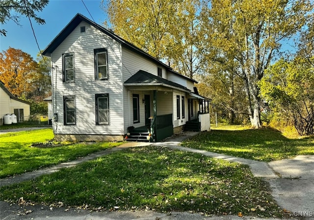 view of front of home with a front yard