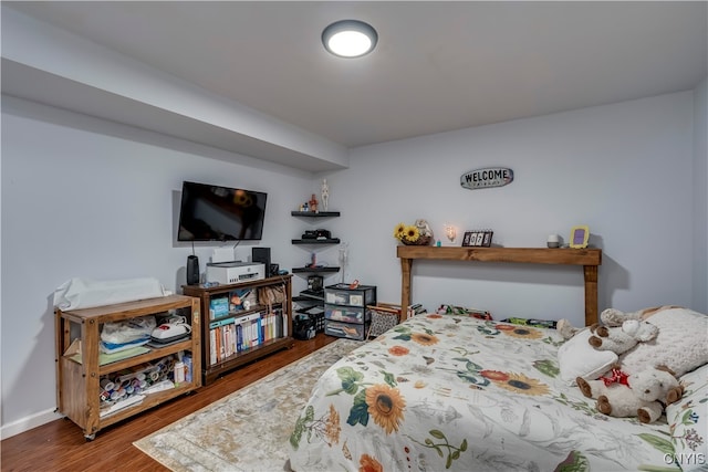 bedroom featuring wood-type flooring