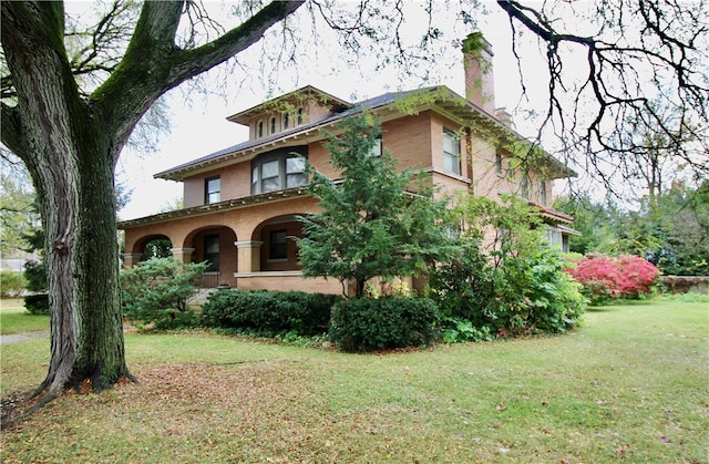 exterior space featuring a yard