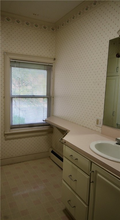 bathroom featuring vanity and a baseboard heating unit