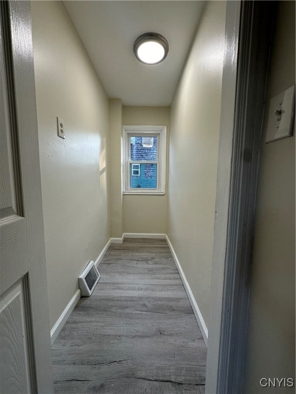 hall featuring light wood-type flooring