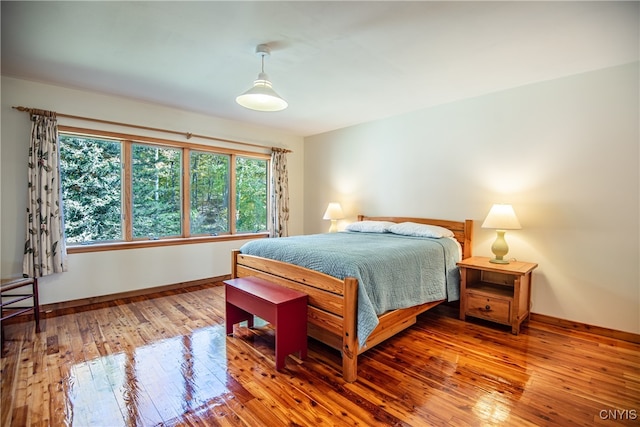 bedroom featuring wood-type flooring