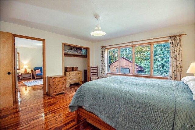 bedroom featuring wood-type flooring