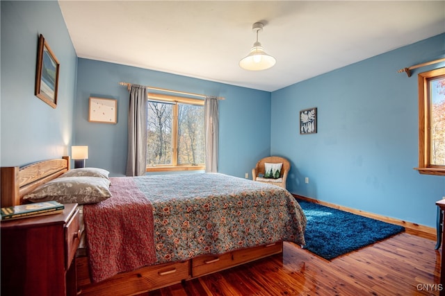 bedroom with hardwood / wood-style floors