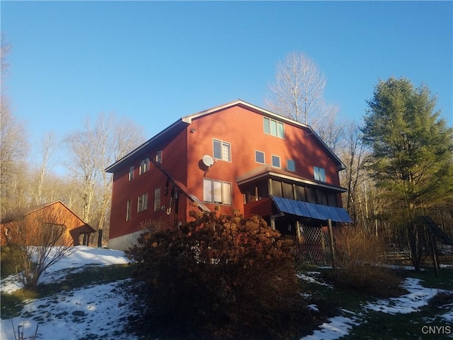 view of snow covered property