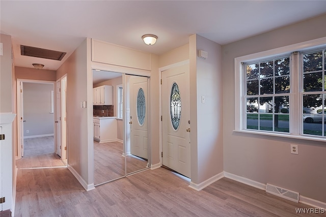 foyer featuring light hardwood / wood-style floors