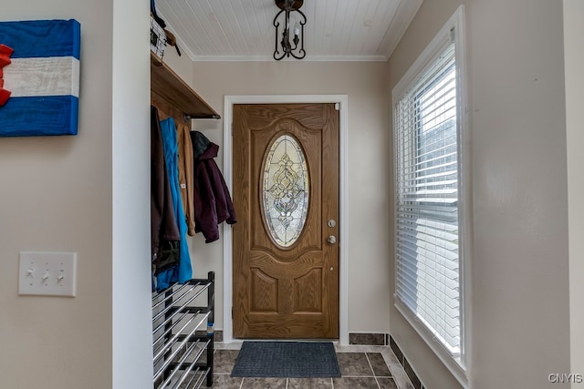 doorway to outside featuring crown molding and wood ceiling