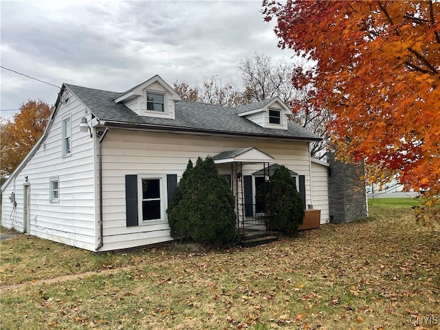 view of property exterior featuring a yard