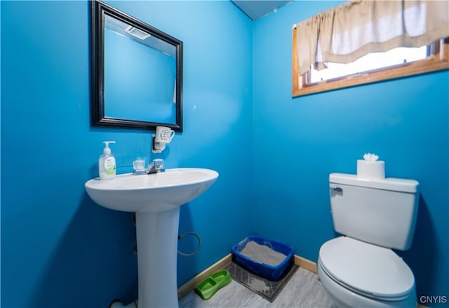 bathroom featuring toilet