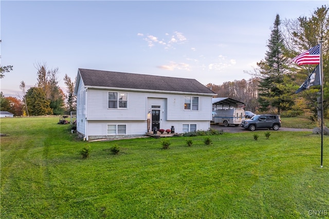 bi-level home featuring a front yard