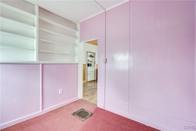 empty room featuring carpet flooring