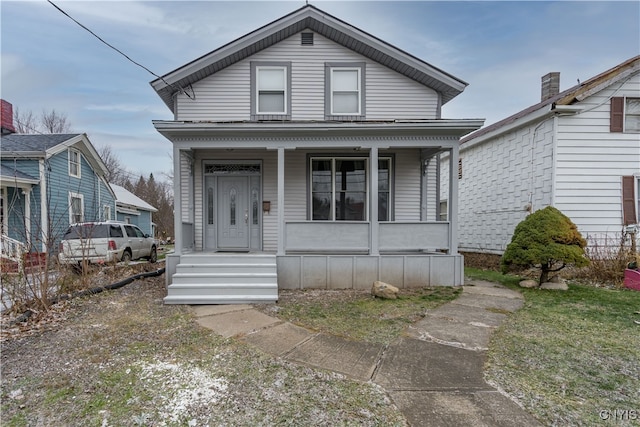 bungalow-style house featuring covered porch