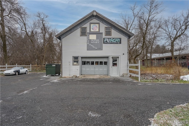 view of home's exterior with a garage