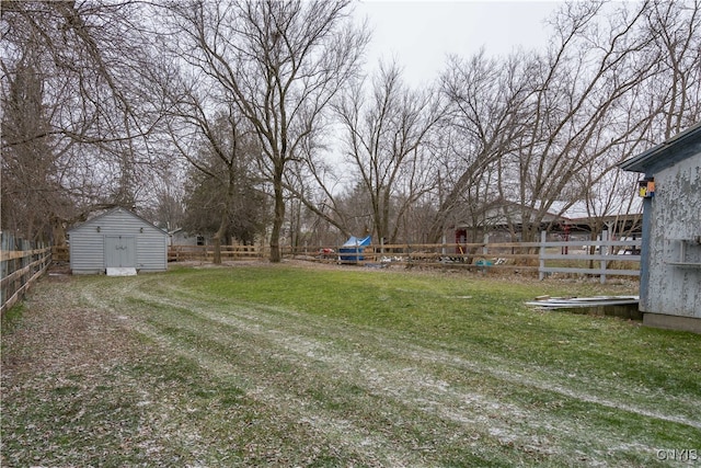 view of yard with a storage shed