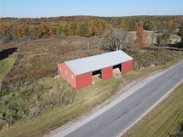 bird's eye view featuring a view of trees